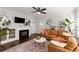 Bright living room with hardwood floors, fireplace, and stylish contemporary furnishings at 655 Mead Se St # 7, Atlanta, GA 30312