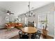Open concept featuring living and dining spaces with hardwood floors and natural lighting at 655 Mead Se St # 7, Atlanta, GA 30312