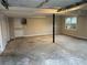 Large garage with high ceilings and natural light offers ample space for parking and storage at 951 Bingham Ln, Stone Mountain, GA 30083