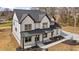 Elegant two-story home boasts a classic design with a covered porch and manicured front yard at 1629 Phillips Rd, Lithonia, GA 30058