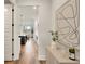 Stylish hallway leading to the kitchen and dining area at 1629 Phillips Rd, Lithonia, GA 30058