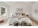 Bright main bedroom featuring high ceilings and neutral decor at 1629 Phillips Rd, Lithonia, GA 30058