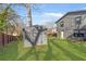 Grassy backyard featuring a storage shed with a modern home architecture at 196 Montgomery Ne St, Marietta, GA 30060