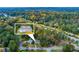 Aerial shot of a home in a tree-filled neighborhood, complete with highlighted property lines at 6596 Wright Rd, Atlanta, GA 30328