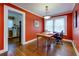 Eat-in dining area with hardwood floors, natural light, and access to the kitchen at 6596 Wright Rd, Atlanta, GA 30328