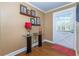 Inviting entryway with a glass-topped table, decorative accents, and a bright white door with window insert at 6596 Wright Rd, Atlanta, GA 30328