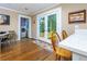 Bright breakfast nook with French doors, stylish seating, and a view to the exterior at 6596 Wright Rd, Atlanta, GA 30328