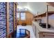 Cozy office space featuring built-in cabinets, natural light, and wood-paneled walls at 6596 Wright Rd, Atlanta, GA 30328