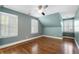 Serene bedroom with hardwood floors, plantation shutters, and neutral paint provides a calm and inviting atmosphere at 1605 E Sussex Ne Rd, Atlanta, GA 30306