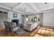 Inviting living room features a fireplace, coffered ceiling and large French doors to backyard at 1605 E Sussex Ne Rd, Atlanta, GA 30306