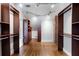 Expansive walk-in closet features custom shelving and exposed brick, offering ample storage and an industrial-chic design at 1605 E Sussex Ne Rd, Atlanta, GA 30306