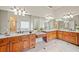 Luxurious bathroom with dual vanities, granite countertops, and framed mirrors providing a spa-like retreat at 1965 Carlotta Ct, Atlanta, GA 30345