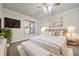 Serene bedroom with a large bed, soft lighting, and a window with natural light at 1965 Carlotta Ct, Atlanta, GA 30345