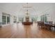 Spacious gathering room features a stone fireplace and hardwood flooring at 1965 Carlotta Ct, Atlanta, GA 30345