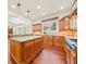 Spacious kitchen with center island, wood cabinets, granite countertops and stainless steel appliances at 1965 Carlotta Ct, Atlanta, GA 30345