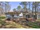 Expansive backyard featuring multiple deck spaces, offering ample room for outdoor activities and relaxation at 3085 Nappa Trl, Stone Mountain, GA 30087