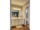 Bathroom vanity with framed mirror; doorway to shower with subway tiles and inset at 3085 Nappa Trl, Stone Mountain, GA 30087