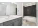 Modern bathroom featuring a sleek vanity and a stylish tiled shower-tub combination at 525 Parkway Ne Dr # 314, Atlanta, GA 30354