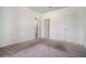 Neutral bedroom with carpet, double closet doors and multiple entryways at 525 Parkway Ne Dr # 314, Atlanta, GA 30354