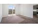 Bright bedroom featuring a sliding glass door leading to a private balcony at 525 Parkway Ne Dr # 314, Atlanta, GA 30354