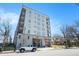 Modern apartment building with balconies, complemented by street parking and landscaped surroundings at 525 Parkway Ne Dr # 314, Atlanta, GA 30354