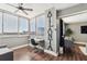 Bright living room featuring an Atlanta wall decoration and a large window offering city views at 215 Piedmont Ne Ave # 1804, Atlanta, GA 30308