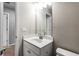 Bathroom featuring single sink vanity and toilet at 3596 Maple Hill Rd, Lithonia, GA 30038