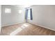 Bedroom featuring two windows and carpeted floors at 3596 Maple Hill Rd, Lithonia, GA 30038