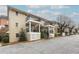 Apartment building featuring balconies with black railings and white columns at 869 Briarcliff Ne Rd # B25, Atlanta, GA 30306