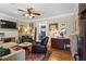 Cozy living room featuring hardwood floors, a decorative fireplace, and comfortable seating at 949 Park Se Ave, Atlanta, GA 30315