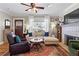 Inviting living room with hardwood floors, a fireplace, and ample natural light at 949 Park Se Ave, Atlanta, GA 30315