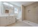 Modern bathroom features a walk-in shower, vanity, and large mirror, providing style and comfort at 200 Adeline Nw Ave, Atlanta, GA 30314