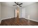 Spacious bedroom with a ceiling fan, wood-look flooring, and neutral paint at 200 Adeline Nw Ave, Atlanta, GA 30314