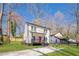 Charming two-story home with a well-manicured lawn and inviting front porch at 200 Adeline Nw Ave, Atlanta, GA 30314
