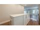 Kitchen island with cabinets and a view of the living area and stainless steel refrigerator at 200 Adeline Nw Ave, Atlanta, GA 30314