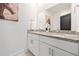Bathroom boasts double sinks with granite countertops and modern fixtures at 2664 Brown Nw St, Atlanta, GA 30318