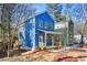 Charming blue two-story home with a welcoming front porch and modern design at 2664 Brown Nw St, Atlanta, GA 30318