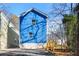 Bright blue two-story home featuring new exterior paint and a well-maintained yard at 2664 Brown Nw St, Atlanta, GA 30318