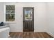 Living room interior featuring a modern door, clean lines, and hardwood floors at 2664 Brown Nw St, Atlanta, GA 30318