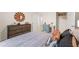 Bedroom with a large dark-wood dresser with views into a walk-in closet at 5441 Flat Rock Point Pt, Stonecrest, GA 30038