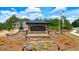 The Enclave at Flat Rock Hills community entrance with decorative signage and landscaping at 5441 Flat Rock Point Pt, Stonecrest, GA 30038