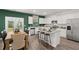 Modern kitchen featuring granite countertops, stainless steel appliances, and ample cabinet space at 5441 Flat Rock Point Pt, Stonecrest, GA 30038