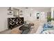 Bright living room with neutral tones, stylish decor, and comfortable seating at 5441 Flat Rock Point Pt, Stonecrest, GA 30038