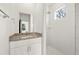 The bathroom features a tiled shower and granite vanity at 2680 Brown Nw St, Atlanta, GA 30318