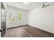 Cozy bedroom with new wood floors, two windows, and a mini-split system at 2680 Brown Nw St, Atlanta, GA 30318