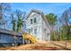 Modern home with a walk-up deck, blue siding and bare yard at 2680 Brown Nw St, Atlanta, GA 30318