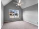 Cozy bedroom filled with natural light with carpet flooring and neutral color palette at 2738 Lakewater Way, Snellville, GA 30039