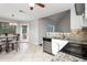 Cozy eat-in kitchen area with granite countertops, stainless steel dishwasher, and views to the outside patio at 2738 Lakewater Way, Snellville, GA 30039