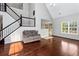 Cozy living room featuring hardwood floors and a comfortable loveseat at 2738 Lakewater Way, Snellville, GA 30039