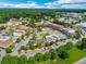 Aerial shot of a vibrant community featuring shops, restaurants, and green spaces at 5705 Odell St, Cumming, GA 30040